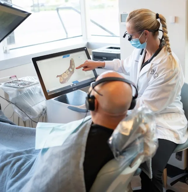 A Stanbrick dentist reviewing results with a patient