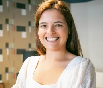 Smiling young woman in a bright Stanbrick dental office