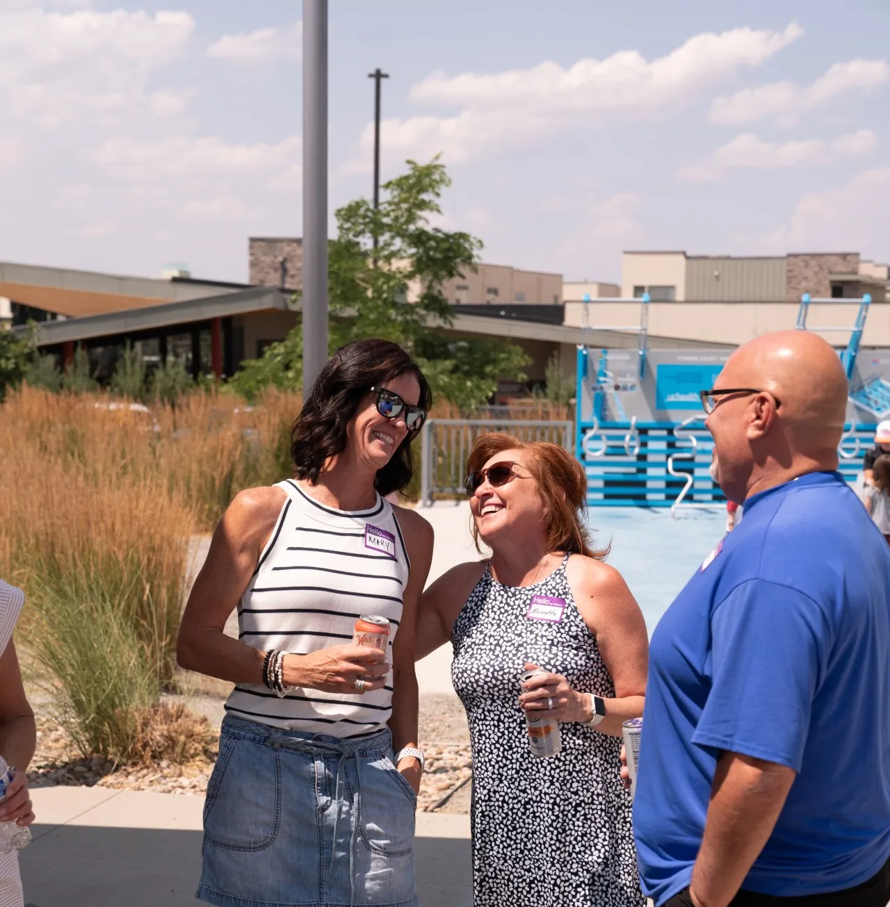 Stanbrick teammates laughing together at a company event