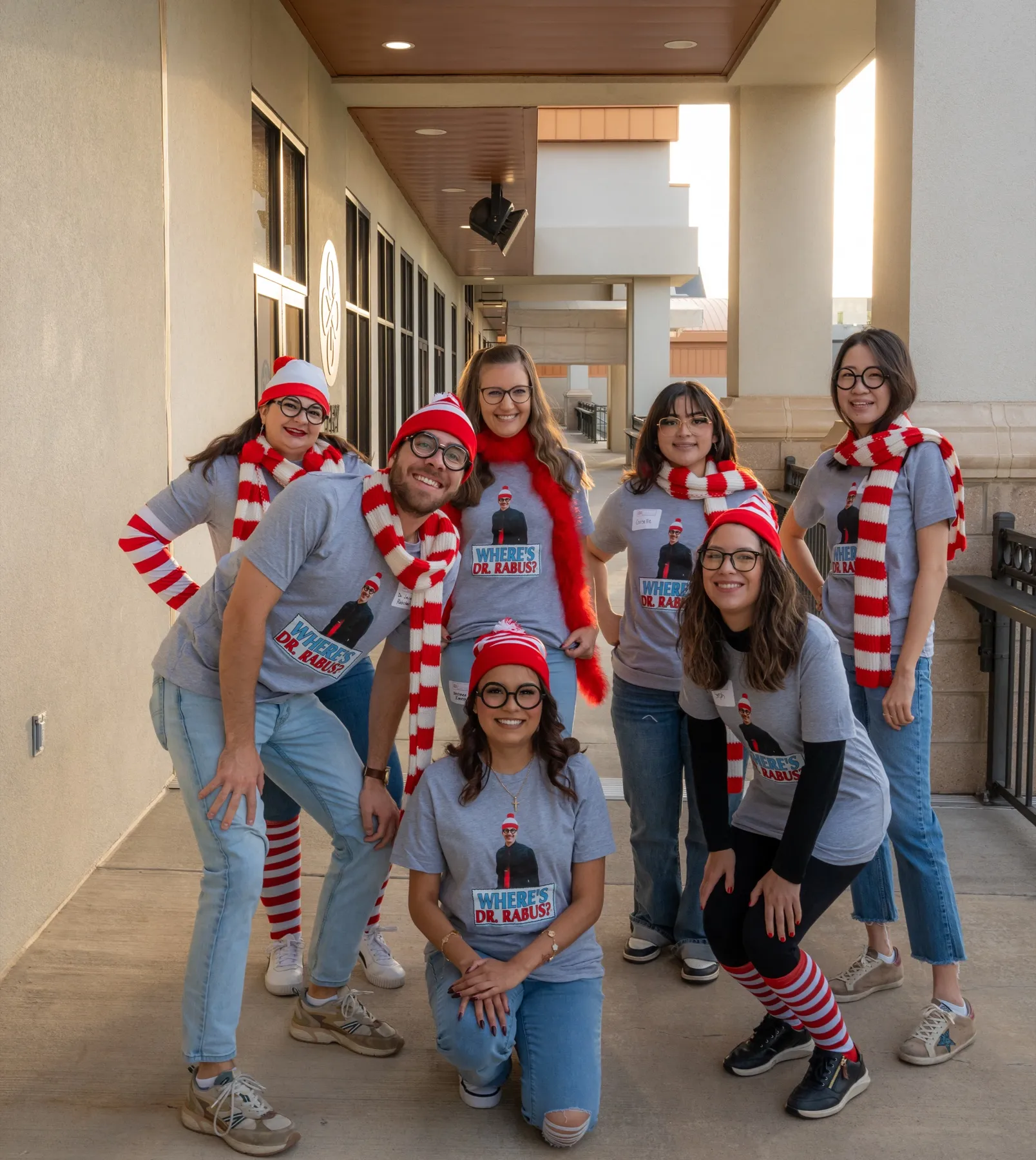Stanbrick team in matching striped costumes at a quarterly meeting