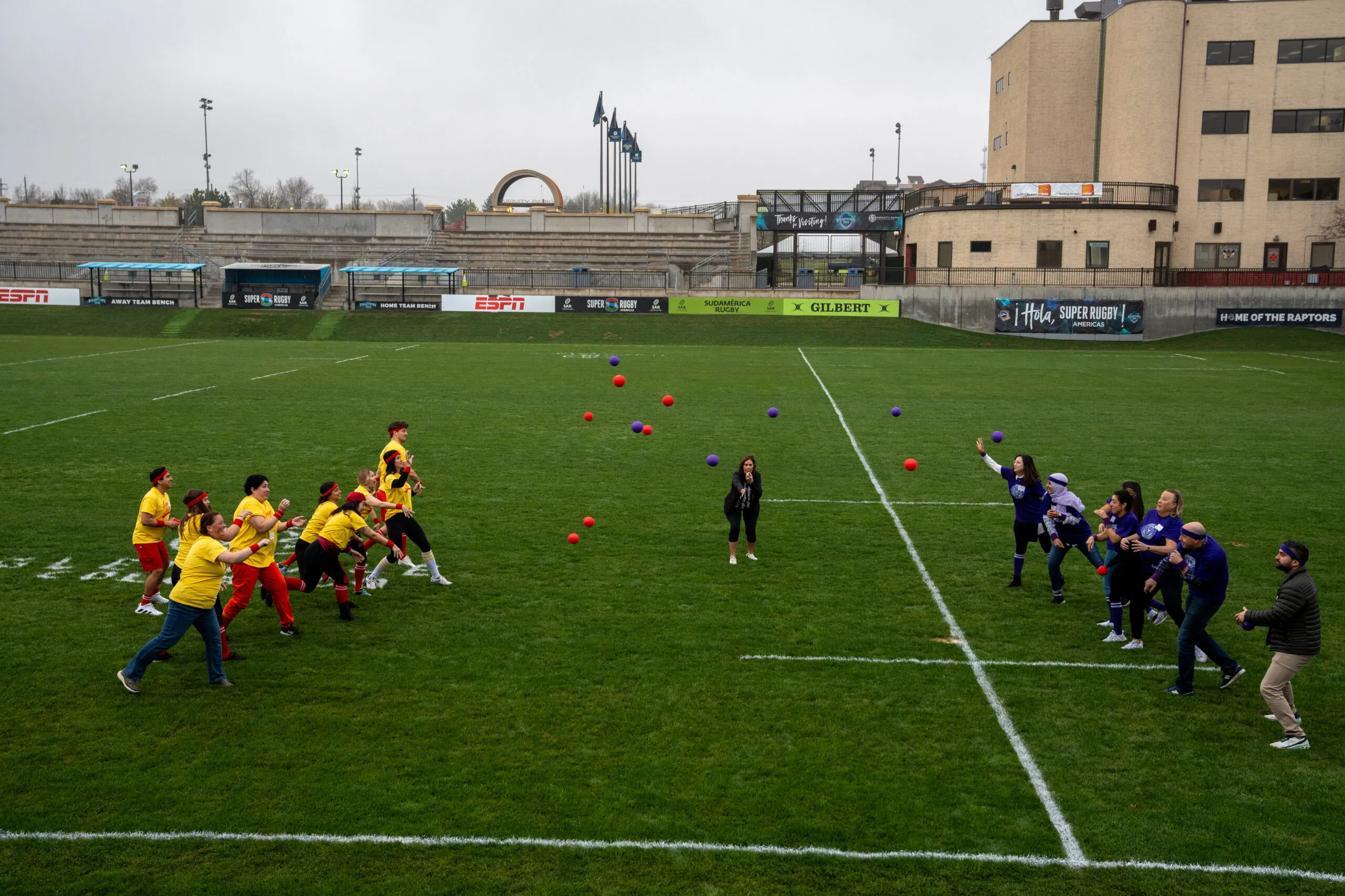 Stanbrick staff playing a game together on the field