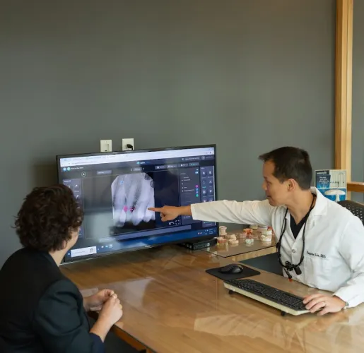 A patient reviewing treatment options with their Stanbrick dentist